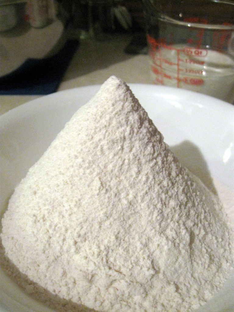 Okay, I don't like sifting flour. But I do love the big fluffy pile it creates.