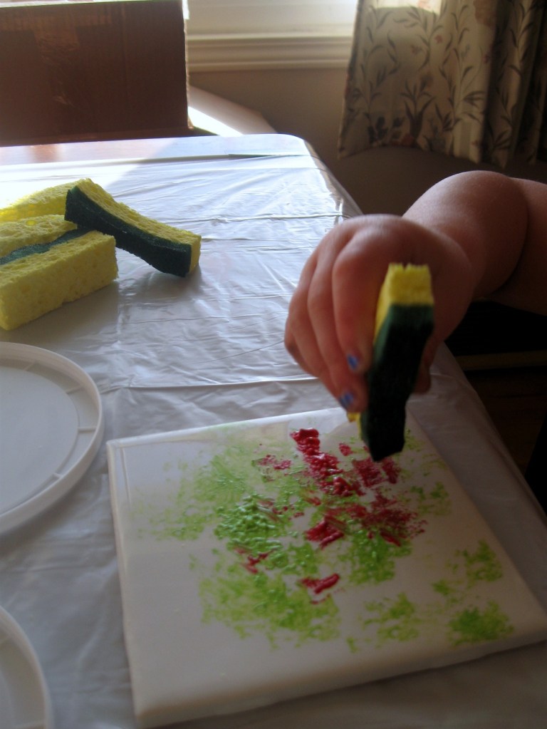 Paint, paint, paint! a three year old tests the limits of acrylic paint and ceramics.