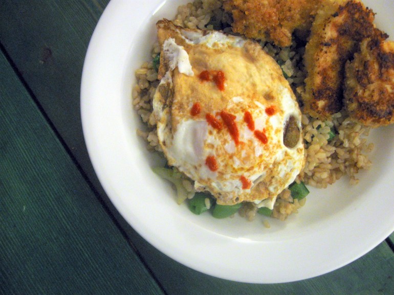 A major point of pride with me has been maintaining a schedule of home-cooked meals despite having a new baby. Tonight was brown rice with fried eggs and panko curry chicken...delish.