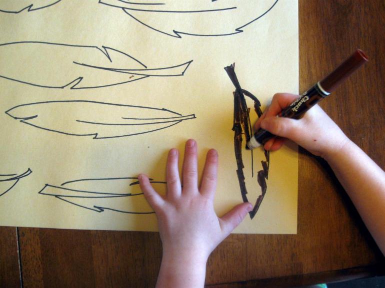 My daughter really loves telling people where to sit when we eat together. So I let her color some feathers that I added names to. Then She placed one on each plate so everyone sat in the "right" place.