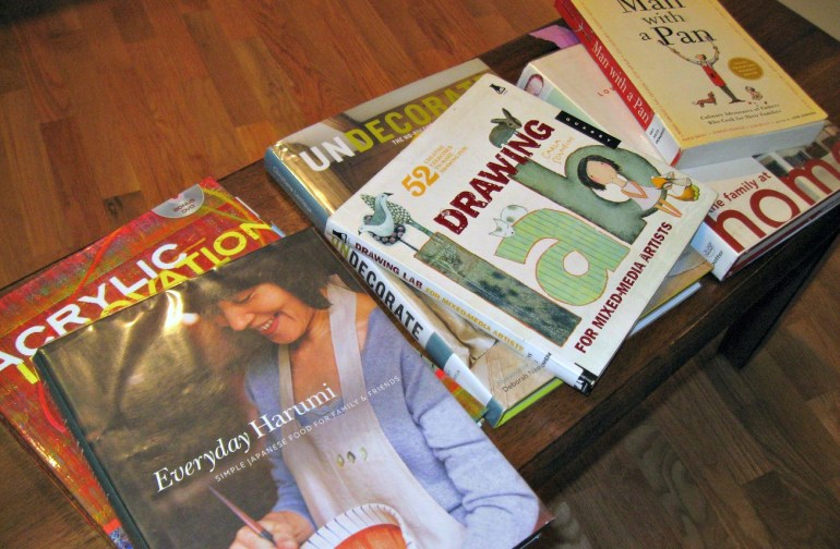 Cooking, art and home design. All this pile is missing is some history and Sedaris, and it would be book heaven.