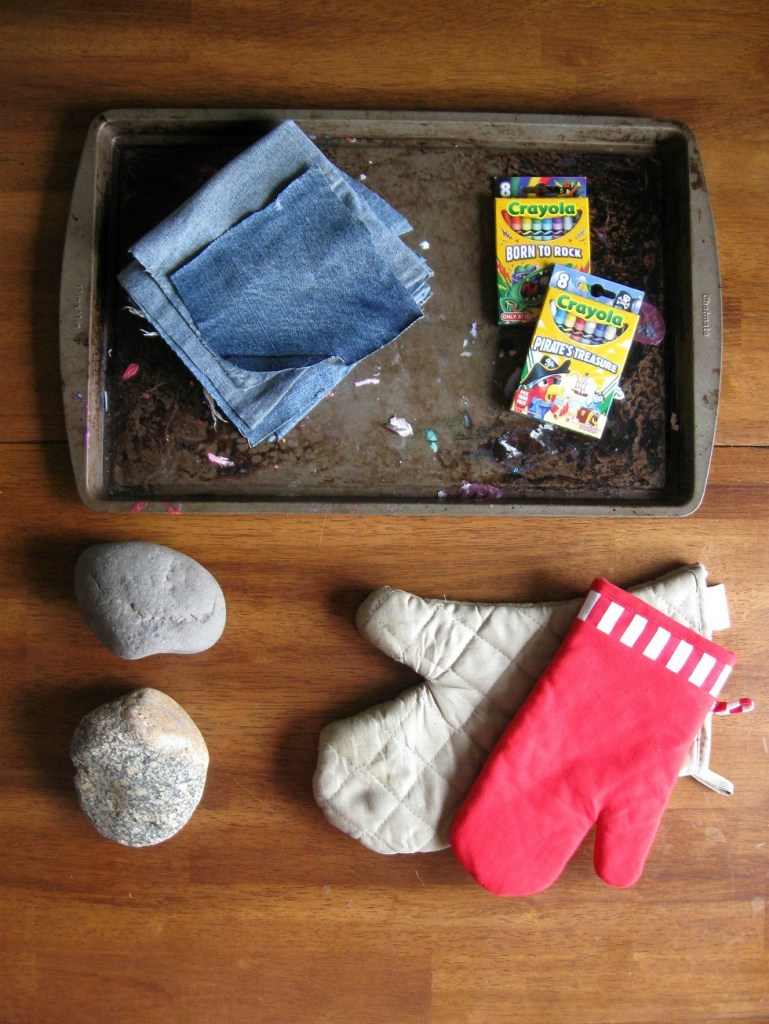 This is a really, really cheap project. I spent $2 on two boxes of crayons at Target. All the rocks were gathered on a walk near our house.