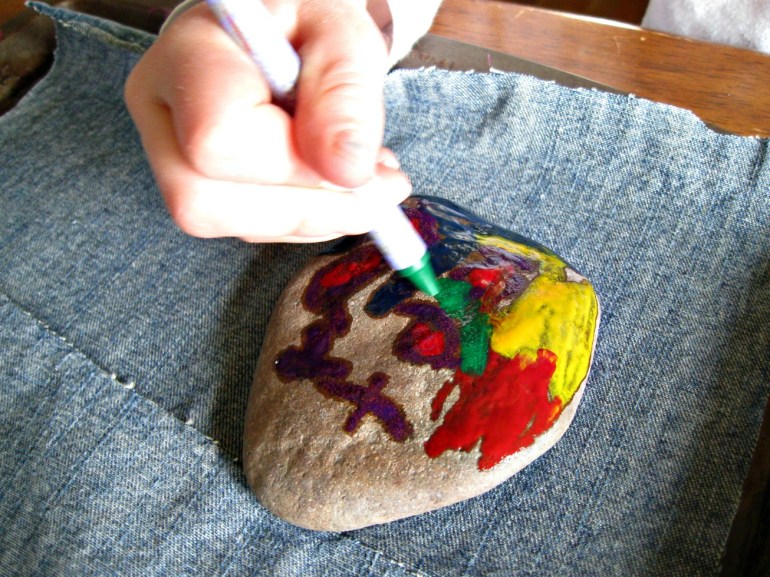 Kid hands, hard at work.