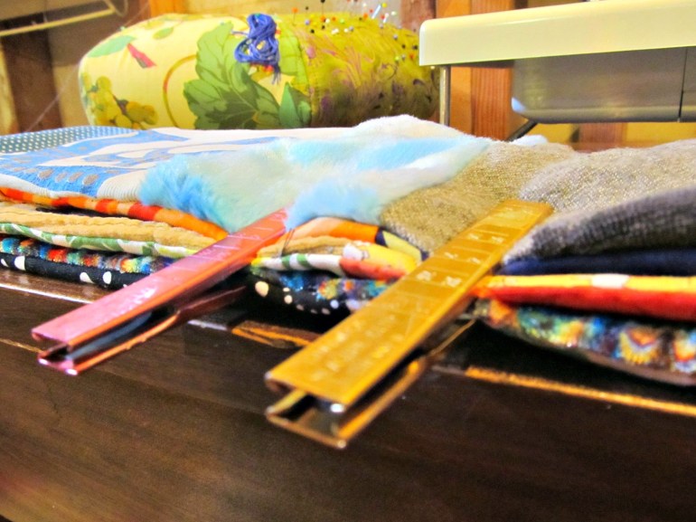 I had to use my aluminum clips to hold everything together. There were so many layers pins couldn't possibly do the job. Then I had to hand-stitch this beast together.