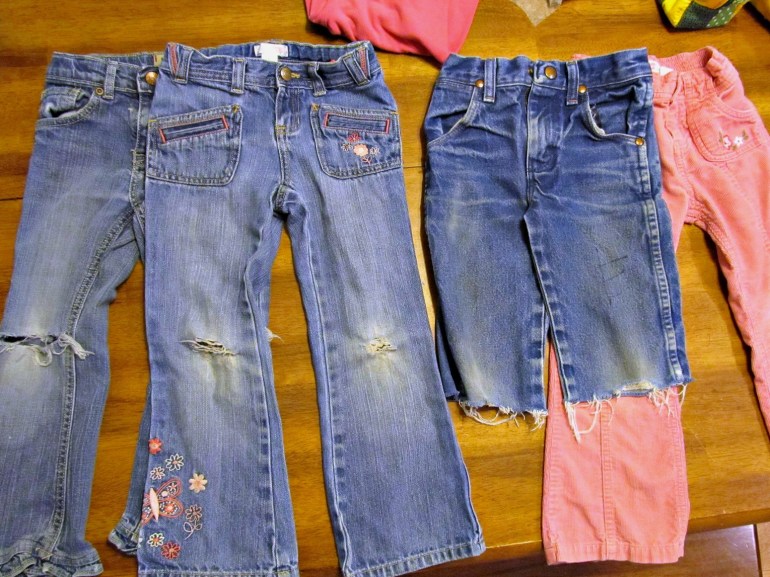 All the pants in need of fixing. The capris were gonig to get turned back into jeans, but there is no real point. So I just covered the marker on the front.