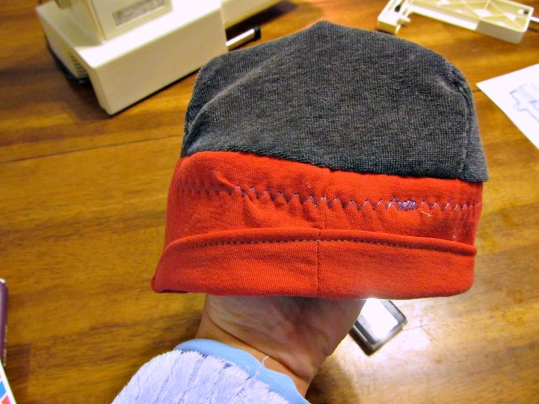 This is the part I turned up. Because of how I assembled the band, it ended up being four layers of jersey fabric. So his little head should stay nice and toasty.