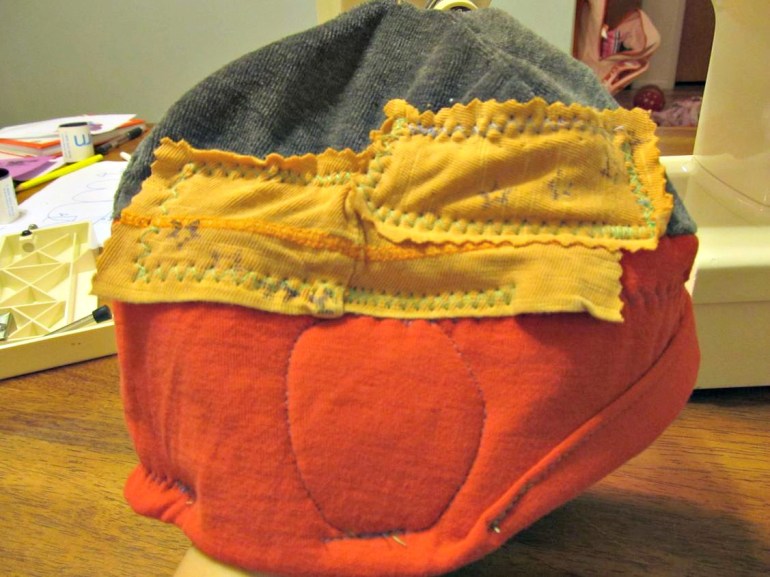 This part is totally not functional. I just wanted to put these little patches of star fabric on the right side to balance out the fasteners on the left side.